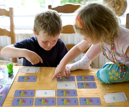 Magic Words sight words for learning to read, chldren playing Memory with the sight word flashcards